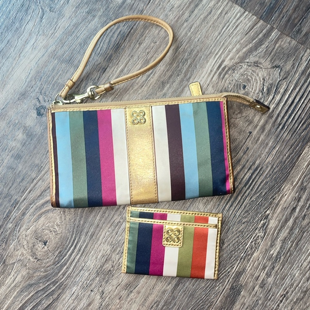 Coach wristlet and card case - multi color stripes with gold accents.